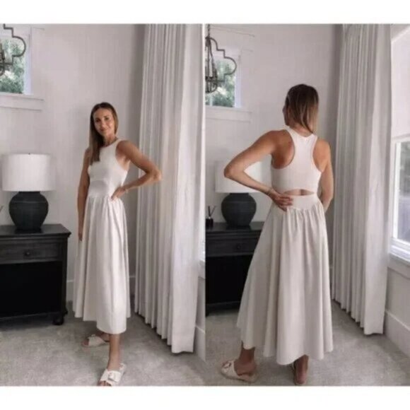 Elegant White Sleeveless Dress - Picture 2 of 16